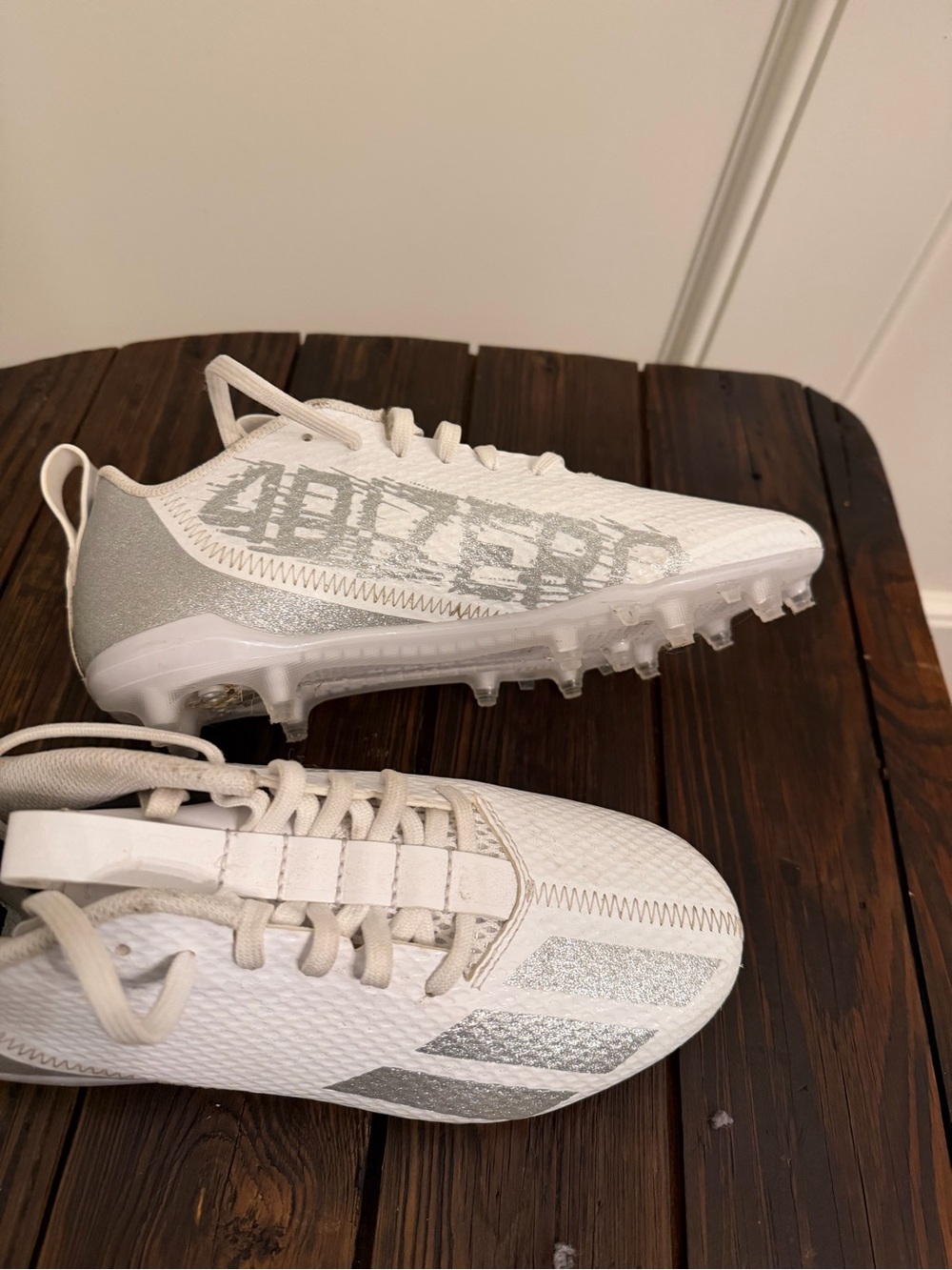 Women’s White and Silver Flag Football Cleats fits regular women’s size 6
